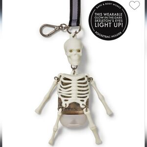 Wearable Glow In The Dark & Light Up Skeleton PocketBac Holder With Sanitizer